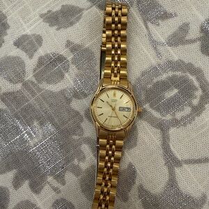 Citizen Gold Tone Stainless Bracelet Watch with Champagne Dial